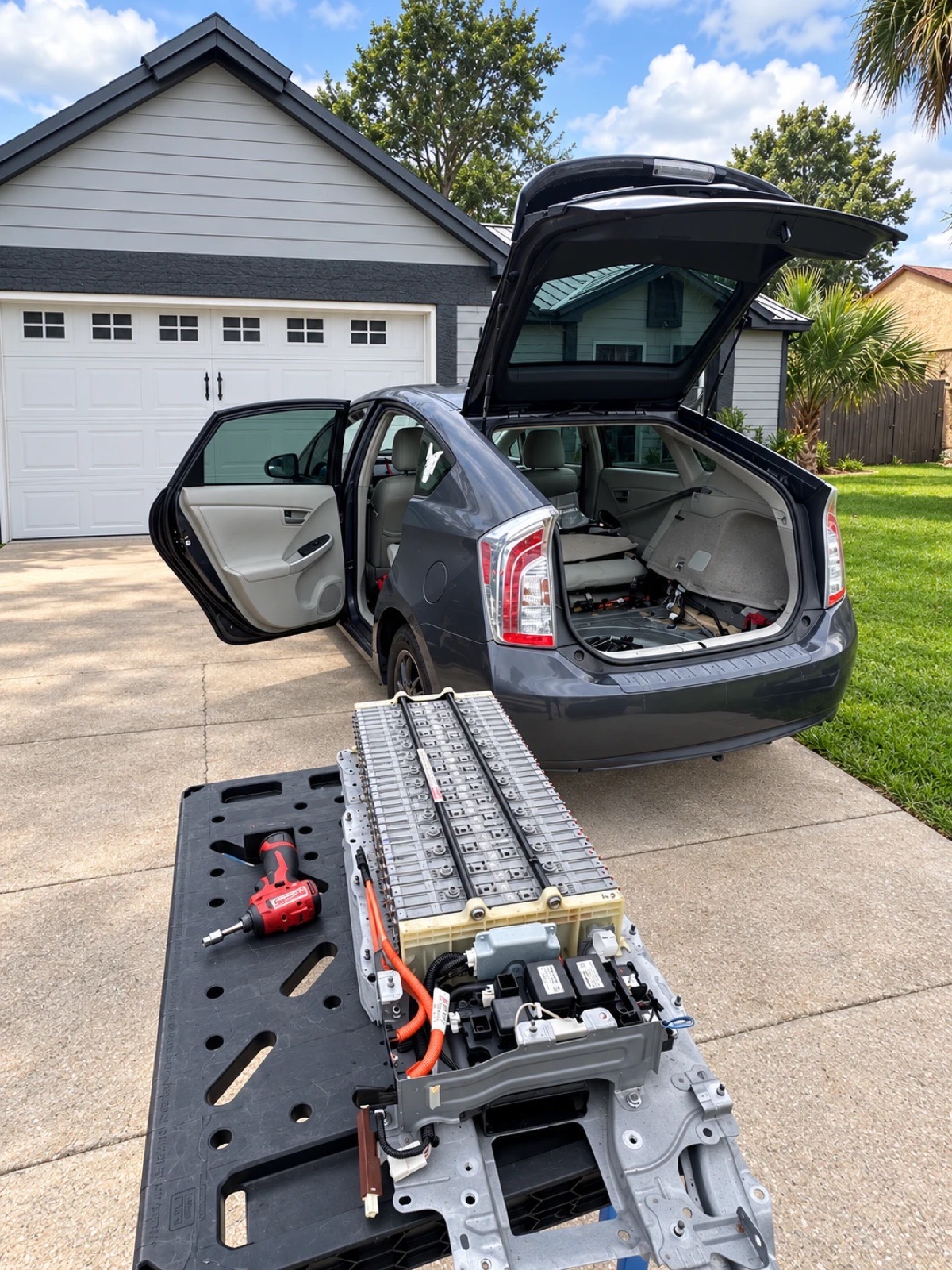 Hybrid battery pack removed from a Prius in a customer's driveway