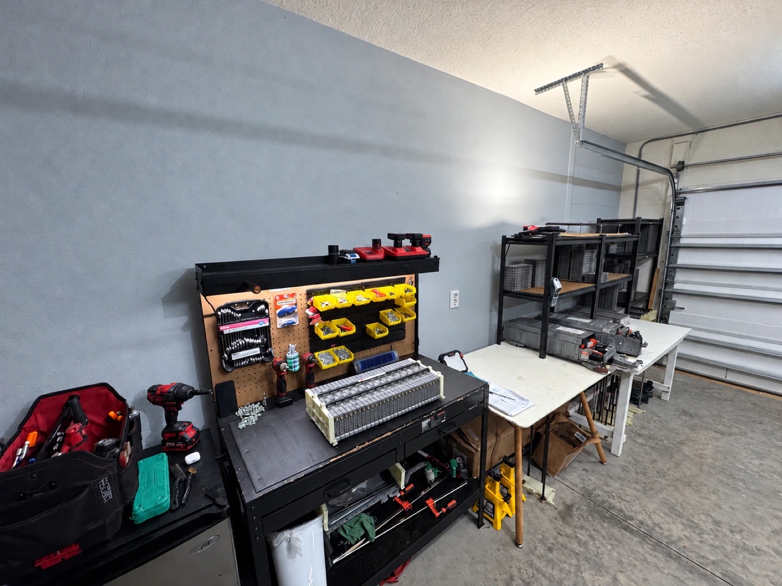 CJ&B workbench with a hybrid battery pack and test racks